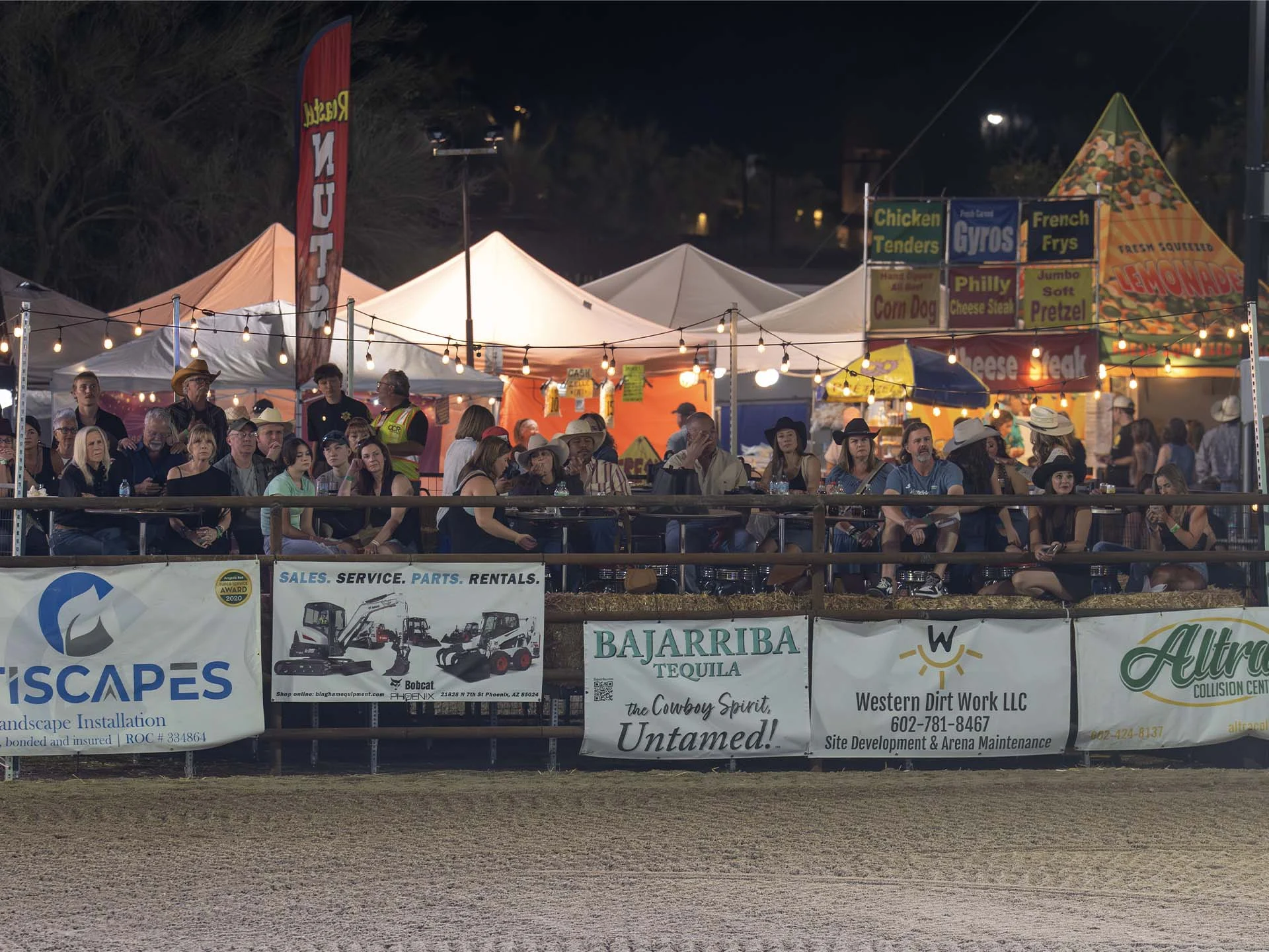 A crowd watches the rodeo in Roper’s Roost which has an elevated platform with the capacity of 40 guests.